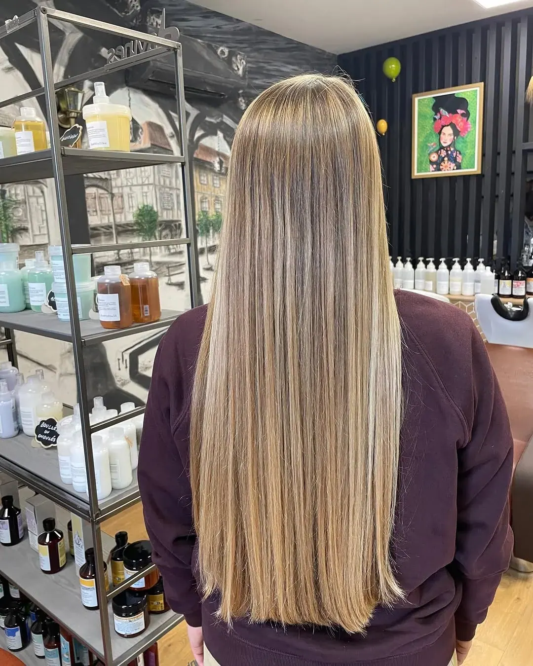 Longueurs lisses et brillantes après un soin au salon